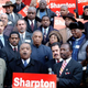 Sharpton with supporters during a media conference on the steps of City Hall Dec. 16, 2003, in New York City (Stephen Chernin/Getty Images)